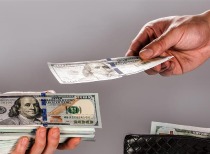 特朗普称美元表现良好，暗示可操控汇率